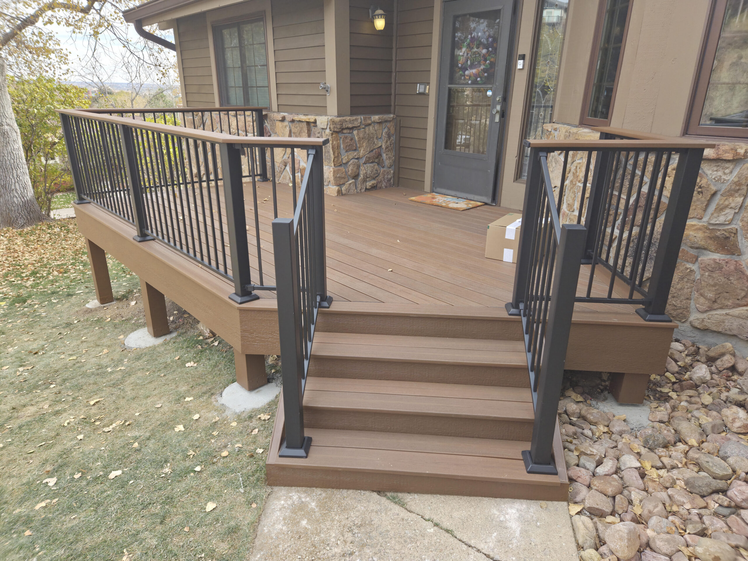 Deck builder Colorado Springs custom composite deck with Fortress FE26 railing