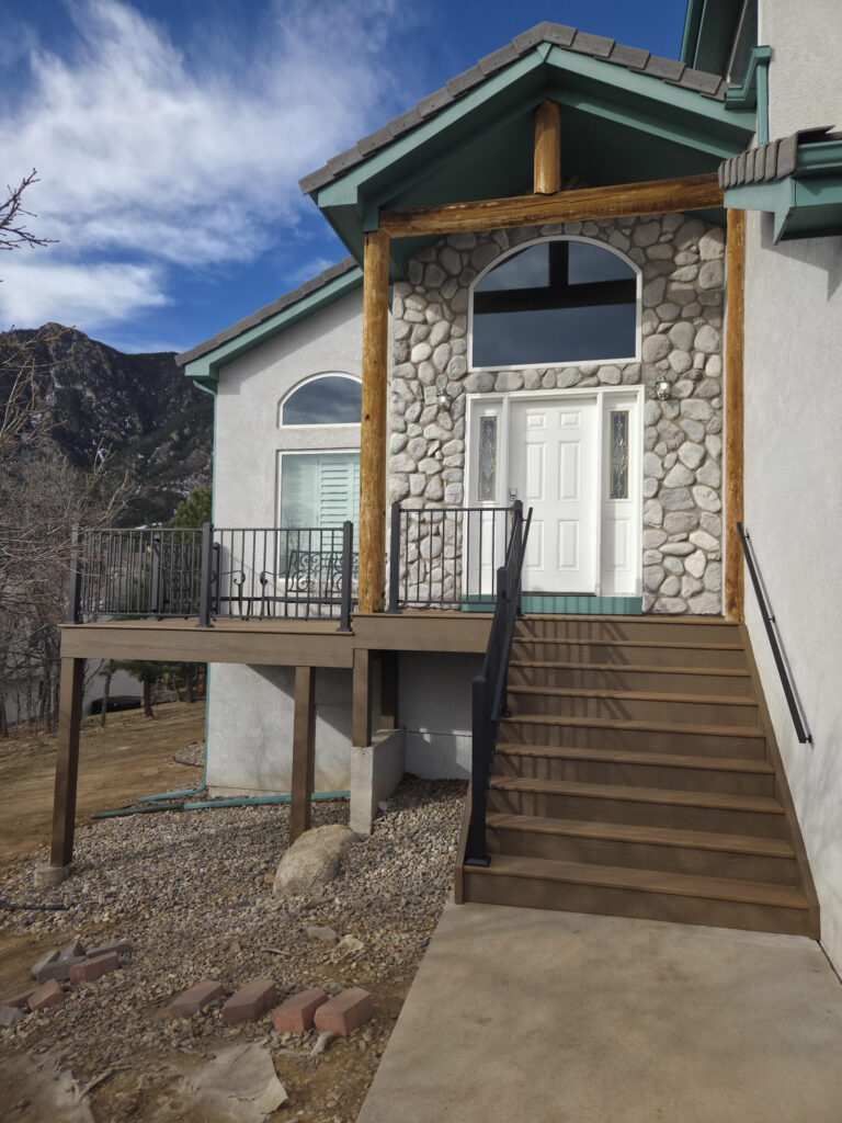 Deck builder Colorado Springs custom composite deck with Fortress railing by O'Leary & Sons