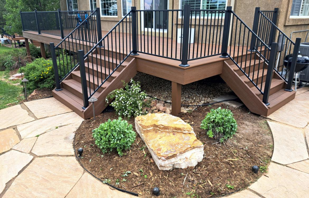 Composite deck with black metal railing built by O'Leary & Sons in Colorado Springs